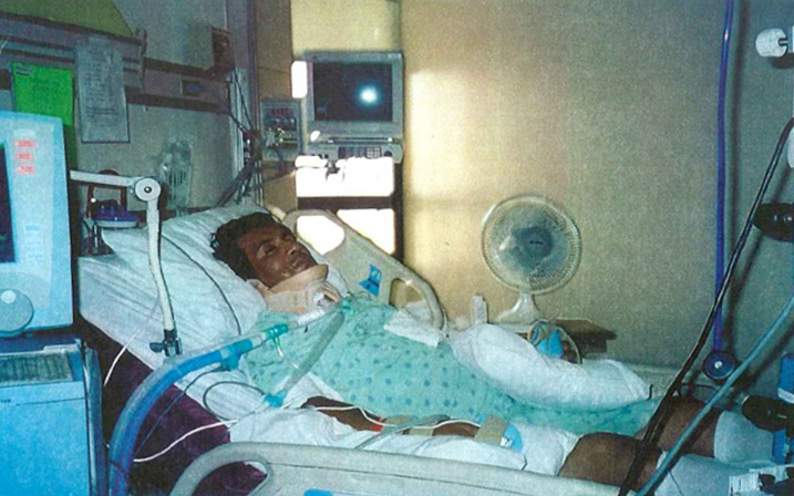 Santiago Arias recovers in the hospital after he fell from the roof of a warehouse in Houston in 2006.